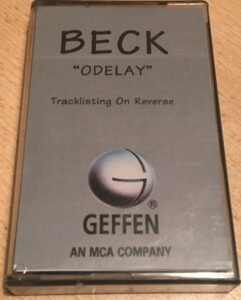 Beck - Odelay [Promo] [#1] (CASSETTE, UK) - Cover